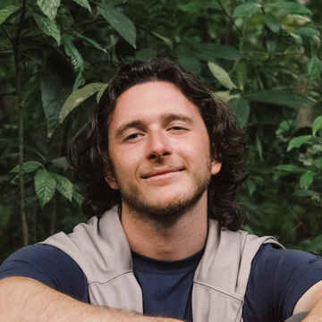 A close up head shot of Ethan, an implausibly handsome young man (if you are to believe his mother)